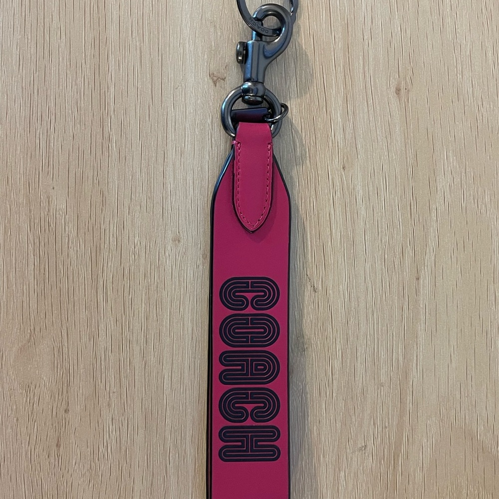 Coach Fuchsia Keychain with Black Lettering